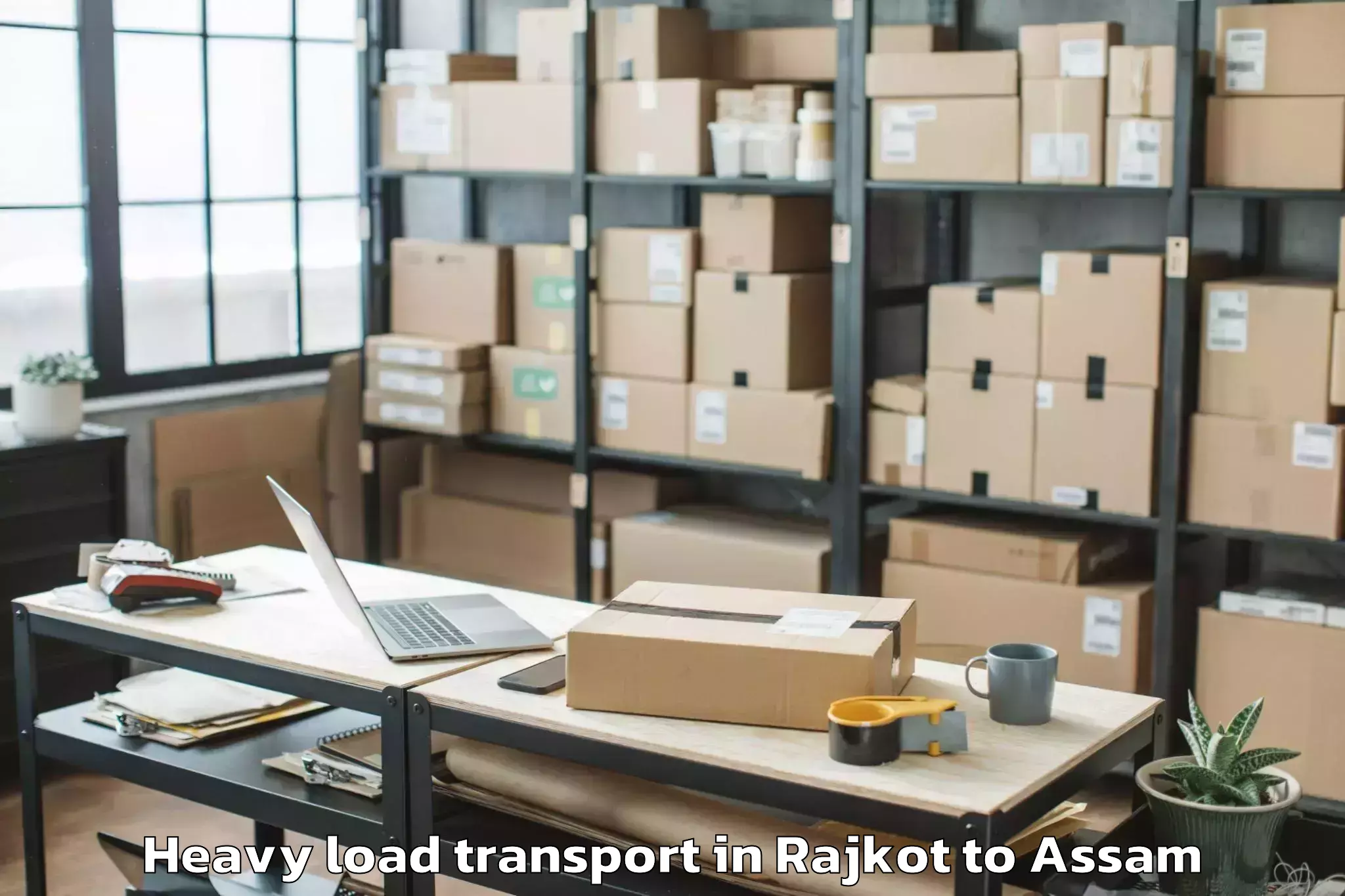 Book Rajkot to Dhuburi Heavy Load Transport Online